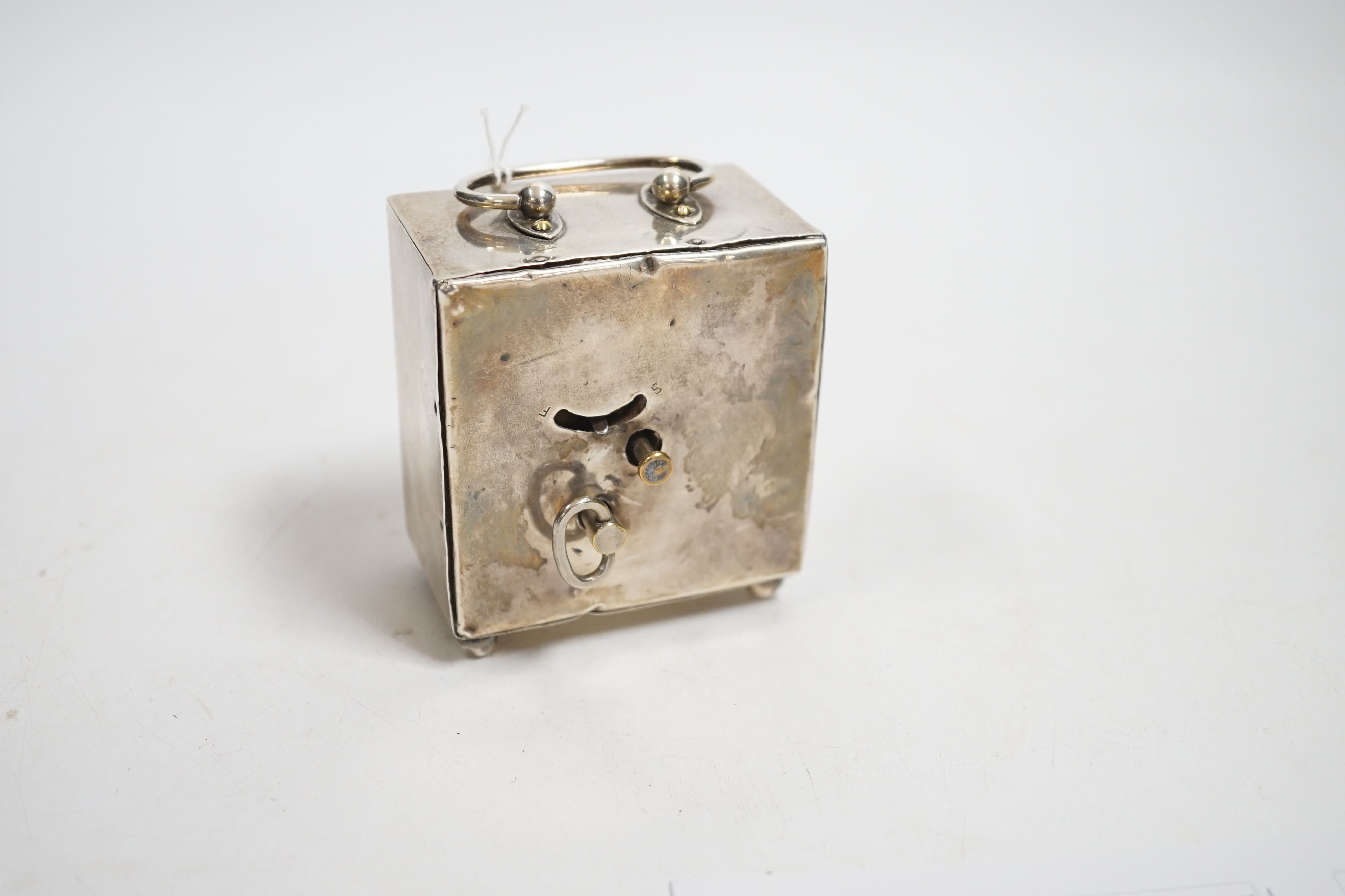 A George V silver rectangular carriage timepiece, with Arabic dial, maker LH, Birmingham, 1912, 72mm excluding handle.